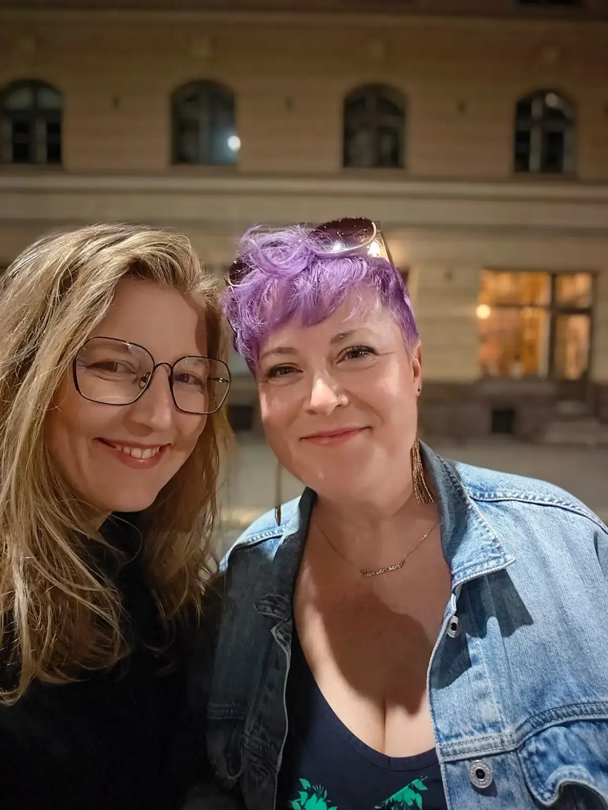 Mari Liis and Hillary together in the evening, smiling at the camera